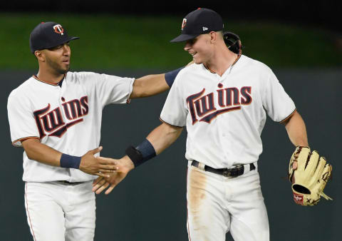 MINNEAPOLIS, MN – AUGUST 16: Eddie Rosario #20 and Max Kepler #26 of the Minnesota Twins celebrate defeating the Detroit Tigers after the game on August 16, 2018 at Target Field in Minneapolis, Minnesota. The Twins defeated the Tigers 15-8. (Photo by Hannah Foslien/Getty Images)