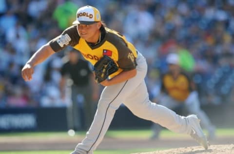 Jul 10, 2016; San Diego, CA, USA; World pitcher Chih-Wei Hu throws a pitch in the 5th inning during the All Star Game futures baseball game at PetCo Park. Mandatory Credit: Gary A. Vasquez-USA TODAY Sports