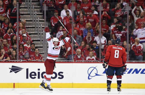 WASHINGTON, DC – APRIL 24: Brock McGinn #23 of the Carolina Hurricanes celebrates after scoring the game winning goal in the second overtime period against the Washington Capitals in Game Seven of the Eastern Conference First Round during the 2019 NHL Stanley Cup Playoffs at Capital One Arena on April 24, 2019 in Washington, DC. The Hurricanes defeated the Capitals 4-3 in the second overtime period to move on to Round Two of the Stanley Cup playoffs. (Photo by Patrick McDermott/NHLI via Getty Images)