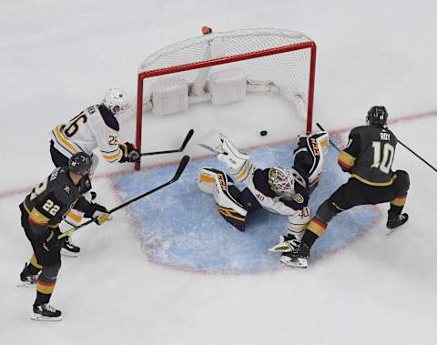 LAS VEGAS, NEVADA – FEBRUARY 28: Nicolas Roy #10 of the Vegas Golden Knights scores a first-period goal against Carter Hutton #40 of the Buffalo Sabres during their game at T-Mobile Arena on February 28, 2020 in Las Vegas, Nevada. (Photo by Ethan Miller/Getty Images)