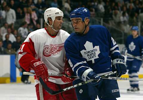 TORONTO – OCTOBER 1: Brett Lebda #41 of the Detroit Red Wings and Tie Domi #28 of the Toronto Maple Leafs  . (Photo By Dave Sandford/Getty Images)