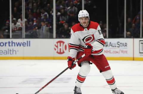 UNIONDALE, NEW YORK – JANUARY 08: Trevor van Riemsdyk #57 of the Carolina Hurricanes skates against the New York Islanders at NYCB Live at the Nassau Veterans Memorial Coliseum on January 08, 2019 in Uniondale, New York. The Hurricanes defeated the Islanders 4-3. (Photo by Bruce Bennett/Getty Images)