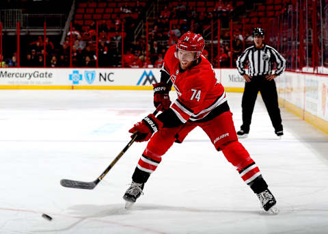 RALEIGH, NC – NOVEMBER 7: Jaccob Slavin #74 of the Carolina Hurricanes shoots the puck during an NHL game against the Florida Panthers on November 7, 2017 at PNC Arena in Raleigh, North Carolina. (Photo by Gregg Forwerck/NHLI via Getty Images)