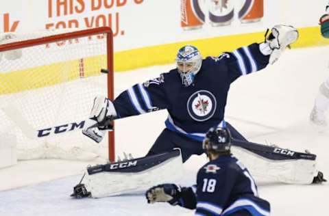 NHL Power Rankings: Winnipeg Jets goalie Connor Hellebuyck (37) makes a save during the second period against the Minnesota Wild at MTS Centre. Mandatory Credit: Bruce Fedyck-USA TODAY Sports