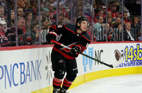 RALEIGH, NC – DECEMBER 31: Erik Haula #56 of the Carolina Hurricanes passes the puck during an NHL game against the Montreal Canadiens on December 31, 2019 at PNC Arena in Raleigh, North Carolina. (Photo by Gregg Forwerck/NHLI via Getty Images)