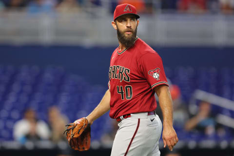 MIAMI, FLORIDA – MAY 04: Madison Bumgarner #40 of the Arizona Diamondbacks yells at umpire Dan Bellino #2 before being ejected from the game as he walks off the mound during the first inning against the Miami Marlins at loanDepot park on May 04, 2022 in Miami, Florida. (Photo by Michael Reaves/Getty Images)