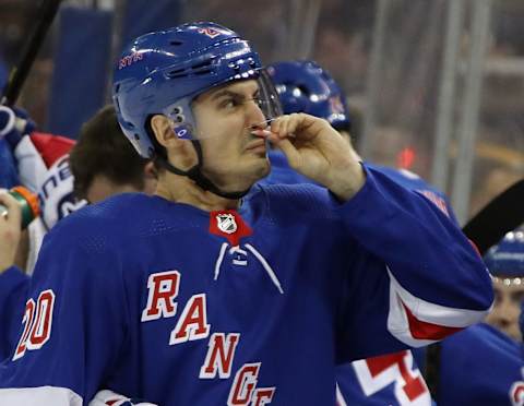 Chris Kreider #20 of the New York Rangers takes in some smelling salts (Photo by Bruce Bennett/Getty Images)