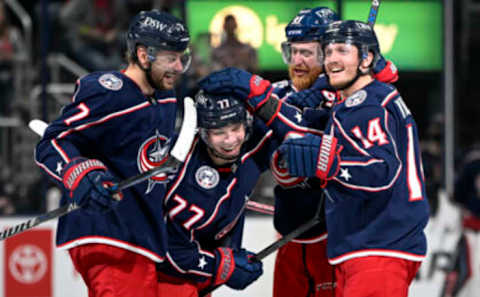 Apr 24, 2022; Columbus, Ohio, USA; Columbus Blue Jackets defenseman Nick Blankenburg (77) celebrates his first NHL goal against the Edmonton Oilers in the third period at Nationwide Arena. Mandatory Credit: Gaelen Morse-USA TODAY Sports