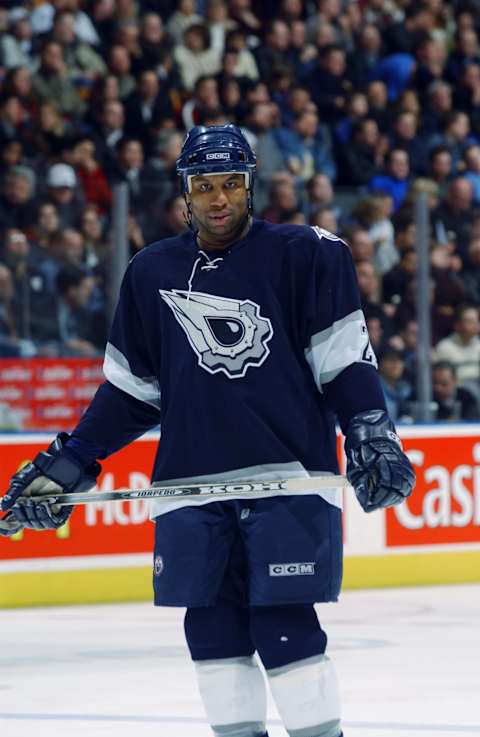 TORONTO – FEBRUARY 11: Georges Laraque #27 of the Edmonton Oilers looks on against the Toronto Maple Leafs during the NHL game at Air Canada Centre on February 11, 2003 in Toronto, Ontario. The Oilers won 5-4. (Photo By Dave Sandford/Getty Images/NHLI)