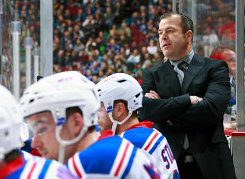 VANCOUVER, BC – DECEMBER 9: Head coach Alain Vigneault of the New York Rangers looks on from the bench from the bench during their NHL game against the Vancouver Canucks at Rogers Arena December 9, 2015 in Vancouver, British Columbia, Canada. (Photo by Jeff Vinnick/NHLI via Getty Images)