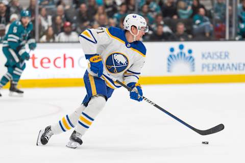 Feb 18, 2023; San Jose, California, USA; Buffalo Sabres left wing Victor Olofsson (71) controls the puck during the second period against the San Jose Sharks at SAP Center at San Jose. Mandatory Credit: Stan Szeto-USA TODAY Sports