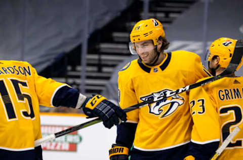 NASHVILLE, TN – JANUARY 14: Calle Jarnkrok #19 of the Nashville Predators celebrates his empty-net goal against the Columbus Blue Jackets during the third period at Bridgestone Arena on January 14, 2021, in Nashville, Tennessee. Nashville defeats Columbus 3-1. (Photo by Brett Carlsen/Getty Images)