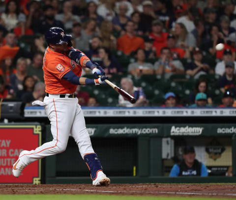 HOUSTON, TEXAS – JUNE 10: Yuli Gurriel #10 of the Houston Astros doubles in the fourth inning against the Miami Marlins at Minute Maid Park on June 10, 2022 in Houston, Texas. (Photo by Bob Levey/Getty Images)