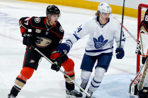 ANAHEIM, CA – NOVEMBER 16: Hampus Lindholm #47 of the Anaheim Ducks battles for position against Kasperi Kapanen #24 of the Toronto Maple Leafs during the game on November 16, 2018 at Honda Center in Anaheim, California. (Photo by Debora Robinson/NHLI via Getty Images)