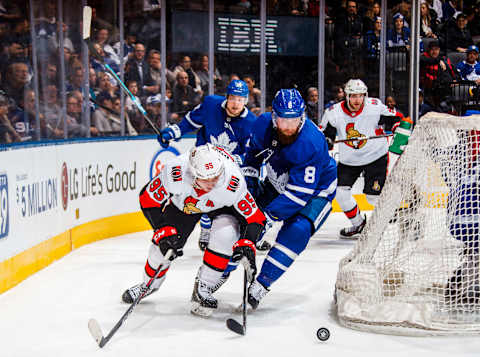 TORONTO, ON – FEBRUARY 6: Matt Duchene #95 of the Ottawa Senators battles with the puck with Jake Muzzin #8 of the Toronto Maple Leafs during the second period at the Scotiabank Arena on February 6, 2019 in Toronto, Ontario, Canada. (Photo by Mark Blinch/NHLI via Getty Images)