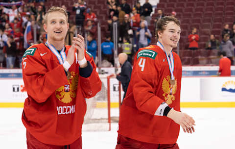 VANCOUVER, BC – JANUARY 5: Dmitri Samorukov #5 and Alexander Alexeyev #4 of Russia celebrates after defeating Switzerland in the Bronze Medal game of the 2019 IIHF World Junior Championship on January, 5, 2019 at Rogers Arena in Vancouver, British Columbia, Canada. (Photo by Rich Lam/Getty Images)