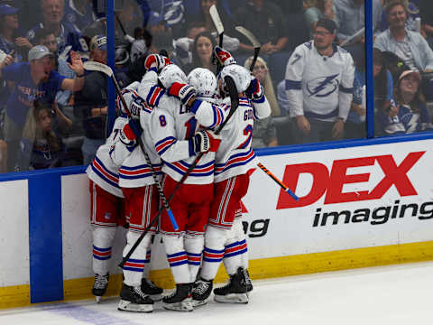 Jun 11, 2022; Tampa, Florida, USA; The New York Rangers celebrate after a goal by center Andrew Copp (18) against the Tampa Bay Lightning in the third period in game six of the Eastern Conference Final of the 2022 Stanley Cup Playoffs at Amalie Arena. Mandatory Credit: Nathan Ray Seebeck-USA TODAY Sports