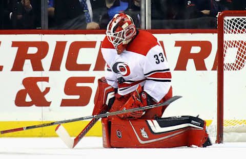 NEW YORK, NY – NOVEMBER 16: Scott Darling #33 of the Carolina Hurricanes makes a first period chest save against the New York Islanders at the Barclays Center on November 16, 2017 in the Brooklyn borough of New York City. (Photo by Bruce Bennett/Getty Images)