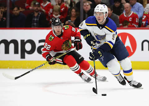 CHICAGO, ILLINOIS – MARCH 08: Sammy Blais #9 of the St. Louis Blues looks to pass chased by Alex Nylander #92 of the Chicago Blackhawks at the United Center on March 08, 2020 in Chicago, Illinois. (Photo by Jonathan Daniel/Getty Images)