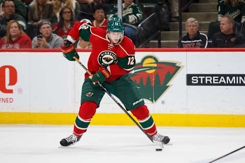 Apr 4, 2017; Saint Paul, MN, USA; Minnesota Wild forward Eric Staal (12) skates with the puck in the third period against the Carolina Hurricanes at Xcel Energy Center. The Minnesota Wild beat the Carolina Hurricanes 5-3. Mandatory Credit: Brad Rempel-USA TODAY Sports