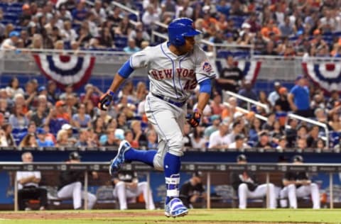 Apr 15, 2017; Miami, FL, USA; New York Mets right fielder Curtis Granderson connects for a triple during the seventh inning against the Miami Marlins at Marlins Park. Mandatory Credit: Steve Mitchell-USA TODAY Sports