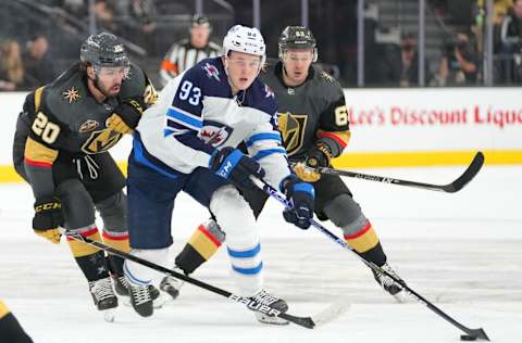 Winnipeg Jets, Kristian Vesalainen (93). Mandatory Credit: Stephen R. Sylvanie-USA TODAY Sports