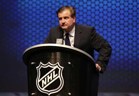 Jun 27, 2014; Philadelphia, PA, USA; Vancouver Canucks general manager Jim Benning announces Jake Virtanen (not pictured) as the number six overall pick to the Vancouver Canucks in the first round of the 2014 NHL Draft at Wells Fargo Center. Mandatory Credit: Bill Streicher-USA TODAY Sports