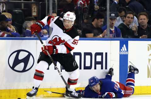 NEW YORK, NEW YORK – APRIL 22: Erik Haula #56 of the New Jersey Devils skates against Artemi Panarin #10 of the New York Rangers during Game Three in the First Round of the 2023 Stanley Cup Playoffs at Madison Square Garden on April 22, 2023, in New York, New York. (Photo by Bruce Bennett/Getty Images)