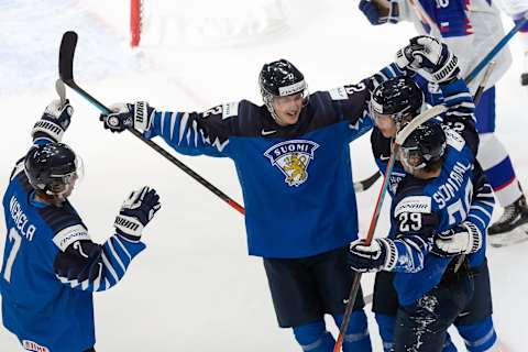 EDMONTON, AB – DECEMBER 30: Topi Niemela #7, Roni Hirvonen #22, Anton Lundell #15 (Photo by Codie McLachlan/Getty Images)