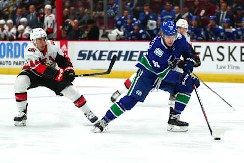 VANCOUVER, BC – SEPTEMBER 25: Vancouver Canucks Center Adam Gaudette (88) skates down ice while watched by Ottawa Senators Center Jean-Gabriel Pageau (44) during their NHL preseason game at Rogers Arena on September 25, 2019 in Vancouver, British Columbia, Canada. (Photo by Devin Manky/Icon Sportswire via Getty Images)