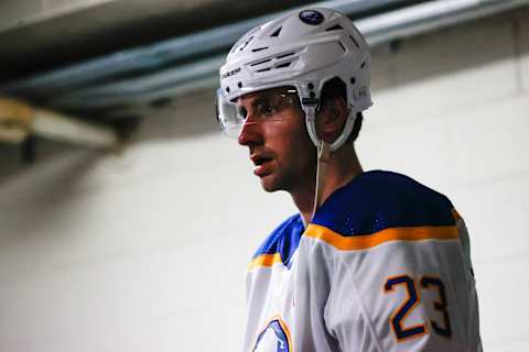 RALEIGH, NC – DECEMBER 02: Mattias Samuelsson #23 of the Buffalo Sabres looks on before the second period of the game against the Carolina Hurricanes at PNC Arena on December 02, 2023 in Raleigh, North Carolina. (Photo by Jaylynn Nash/Getty Images)