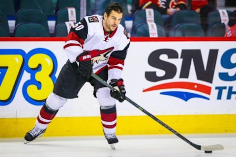 Jan 7, 2016; Calgary, Alberta, CAN; Arizona Coyotes center Antoine Vermette (50) controls the puck against the Calgary Flames during the warmup period at Scotiabank Saddledome. Arizona Coyotes won 2-1. Mandatory Credit: Sergei Belski-USA TODAY Sports