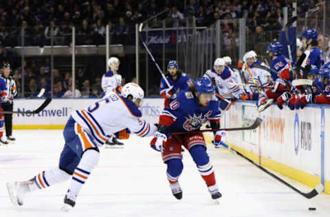 NEW YORK, NEW YORK – NOVEMBER 26: Cody Ceci #5 of the Edmonton Oilers slows down Artemi Panarin #10 of the New York Rangers during the second period at Madison Square Garden on November 26, 2022, in New York City. (Photo by Bruce Bennett/Getty Images)