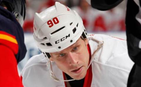 SUNRISE, FL – DECEMBER 10: Stephen Weiss #90 of the Detroit Red Wings prepares for a face-off against the Florida Panthers at the BB&T Center on December 10, 2013 in Sunrise, Florida. The Panthers defeated the red Wings 3-2 in a shootout. (Photo by Joel Auerbach/Getty Images)