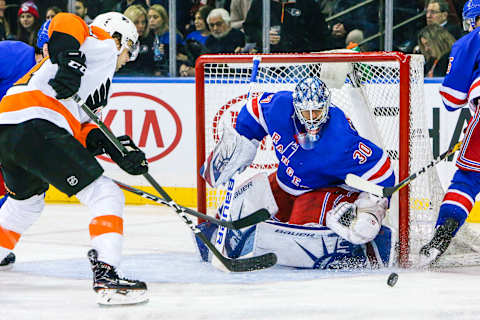 NEW YORK, NY – JANUARY 16: New York Rangers Goalie Henrik Lundqvist (30) tracks puck near his net during the Philadelphia Flyers and New York Rangers NHL game on January 16, 2018, at Madison Square Garden in New York, NY. (Photo by John Crouch/Icon Sportswire via Getty Images)