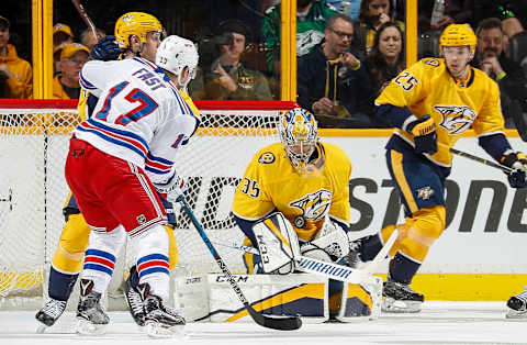 NASHVILLE, TN – FEBRUARY 3: Pekka Rinne #35 of the Nashville Predators makes the save against Jesper Fast #17 of the New York Rangers during an NHL game at Bridgestone Arena on February 3, 2018 in Nashville, Tennessee. (Photo by John Russell/NHLI via Getty Images)