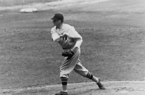 American baseball player Walter Johnson (1887 – 1946), pitcher for the Washington Senators, throws from the mound during a game, 1942. (Photo by Bruce Bennett Studios/Getty Images)