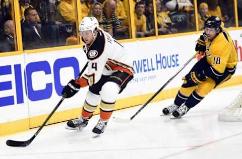 Apr 19, 2016; Nashville, TN, USA; Anaheim Ducks defenseman Cam Fowler (4) skates behind the net against the Nashville Predators right winger James Neal (18) during the first period in game three of the first round of the 2016 Stanley Cup Playoffs at Bridgestone Arena. Mandatory Credit: Christopher Hanewinckel-USA TODAY Sports