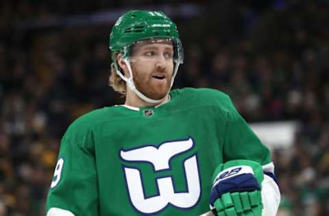 BOSTON, MASSACHUSETTS – MARCH 05: Dougie Hamilton #19 of the Carolina Hurricanes looks on during the first period against the Boston Bruins at TD Garden on March 05, 2019 in Boston, Massachusetts. (Photo by Maddie Meyer/Getty Images)