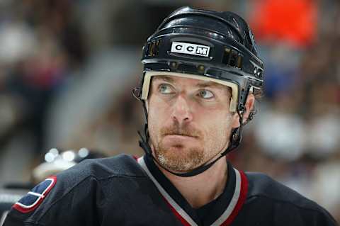 Left-wing Brad May #10 of the Vancouver Canucks looks on (Photo by Jeff Vinnick/Getty Images)