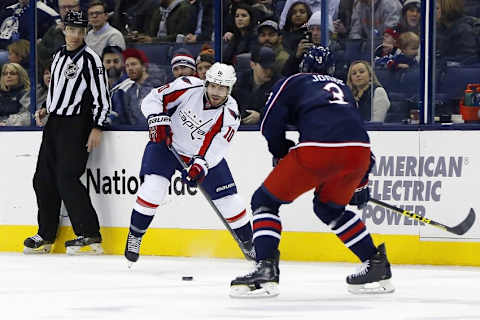 Jan 19, 2016; Columbus, OH, USA; Washington Capitals center Mike Richards (10) passes the puck as Columbus Blue Jackets defenseman Seth Jones (3) defends during the third period at Nationwide Arena. The Caps won 6-3. Mandatory Credit: Russell LaBounty-USA TODAY Sports