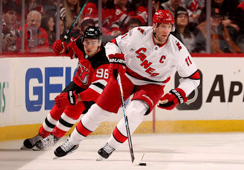 Carolina Hurricanes, Jordan Staal #11, New Jersey Devils, Timo Meier #96. (Photo by Elsa/Getty Images)