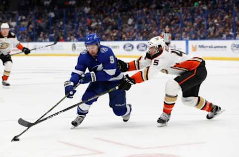 TAMPA, FL – NOVEMBER 27: Tampa Bay Lightning center Tyler Johnson (9) is defended by Anaheim Ducks defenseman Andy Welinski (45) in the second period of the regular season NHL game between the Anaheim Ducks and Tampa Bay Lightning on November 27, 2018 at Amalie Arena in Tampa, FL. (Photo by Mark LoMoglio/Icon Sportswire via Getty Images)