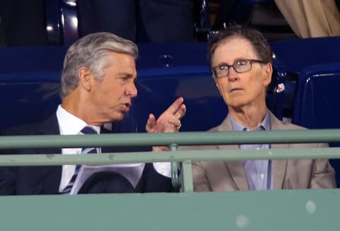 BOSTON – AUGUST 20: Red Sox new president of baseball operations Dave Dombrowski, left, chats with Sox owner John Henry as they sit in the EMC level. The Boston Red Sox host the Kansas City Royals at Fenway Park in Boston on Aug. 20, 2015. (Photo by John Tlumacki/The Boston Globe via Getty Images)