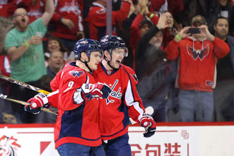 Jan 23, 2017; Washington, DC, USA; Washington Capitals defenseman Dmitry Orlov (9) celebrates with Capitals center Evgeny Kuznetsov (92) after scoring a goal against the Carolina Hurricanes in the first period at Verizon Center. Mandatory Credit: Geoff Burke-USA TODAY Sports