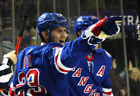 NEW YORK, NEW YORK – JANUARY 19: Adam Fox #23 of the New York Rangers celebrates his second period goal against the Toronto Maple Leafs at Madison Square Garden on January 19, 2022 in New York City. (Photo by Bruce Bennett/Getty Images)