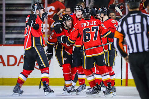 Mar 17, 2017; Calgary, Alberta, CAN; Calgary Flames left wing Matthew Tkachuk (19) celebrates his goal with teammates against the Dallas Stars during the second period at Scotiabank Saddledome. Mandatory Credit: Sergei Belski-USA TODAY Sports