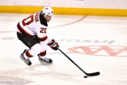 Jan 12, 2016; St. Louis, MO, USA; New Jersey Devils right wing Lee Stempniak (20) skates with the puck against the St. Louis Blues during the third period at Scottrade Center. The St. Louis Blues defeat the New Jersey Devils 5-2. Mandatory Credit: Jasen Vinlove-USA TODAY Sports