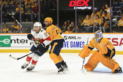 NASHVILLE, TN – SEPTEMBER 16: Nashville Predators defenseman Dan Hamhuis (5) defends against Panthers forward Jake Horton (48) during the second NHL preseason game between the Nashville Predators and Florida Panthers, held on September 16, 2019, at Bridgestone Arena in Nashville, Tennessee. (Photo by Danny Murphy/Icon Sportswire via Getty Images)