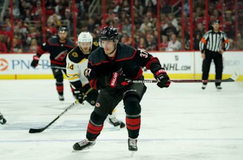 RALEIGH, NC – MAY 14: Andrei Svechnikov #37 of the Carolina Hurricanes skates for a loose puck in Game Three of the Eastern Conference Third Round against the Boston Bruins during the 2019 NHL Stanley Cup Playoffs on May 14, 2019 at PNC Arena in Raleigh, North Carolina. (Photo by Gregg Forwerck/NHLI via Getty Images)